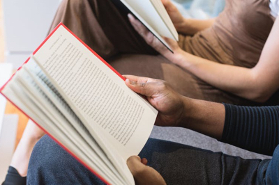 People sitting and reading books.